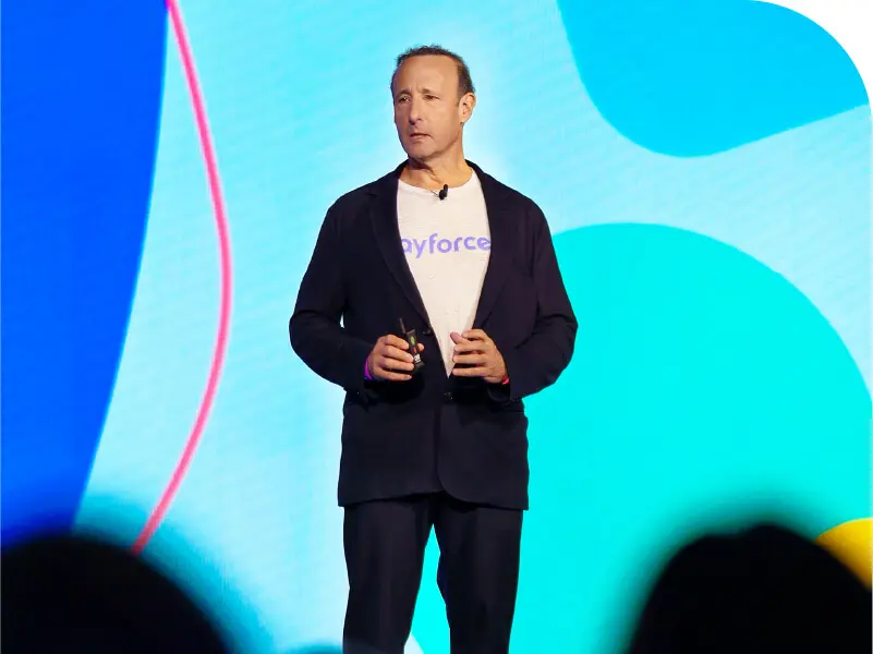 David Ossip presents on stage at Dayforce Discover