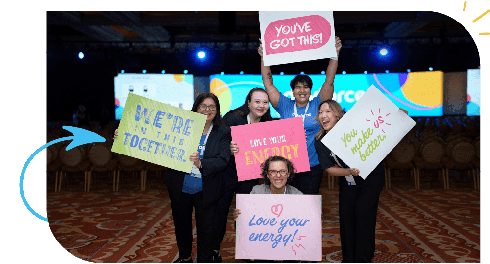 Dayforce Employees at Dayforce Discover with cheer signs